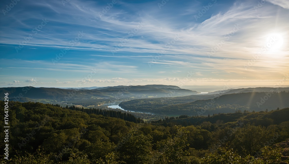 Naklejka premium Scenic View Featuring a Cloudy Sky Above the Terrain
