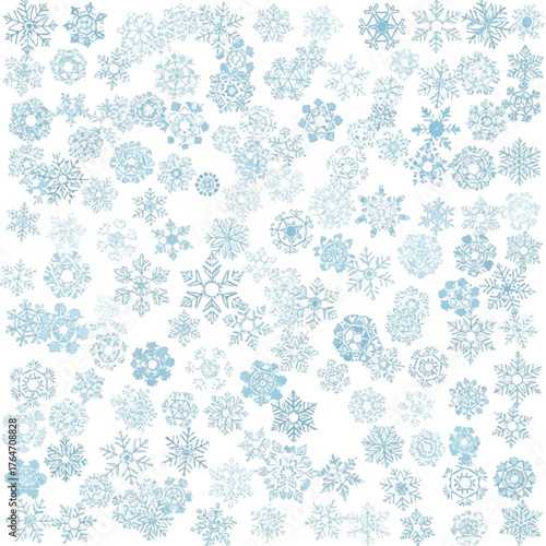 Collection of various blue snowflakes on a white background with a festive and wintry mood in a flat lay composition.