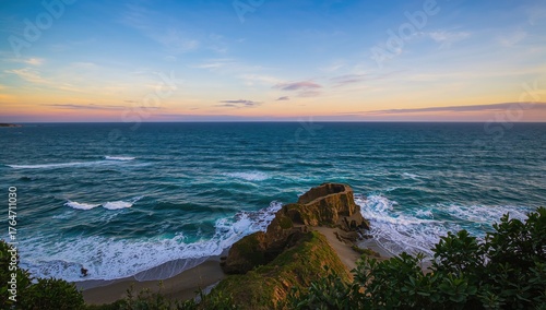 Beautiful outlook of the jetty and surf from a stony point