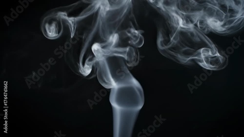 Ephemeral Dance of Vapor: Intricate patterns of ethereal vapor twist and twirl against a dark canvas, creating a mesmerizing display of transience and delicate beauty.