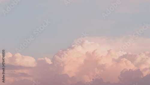 Fototapeta Naklejka Na Ścianę i Meble -  Photo of rosy and golden clouds set against a pale azure sky