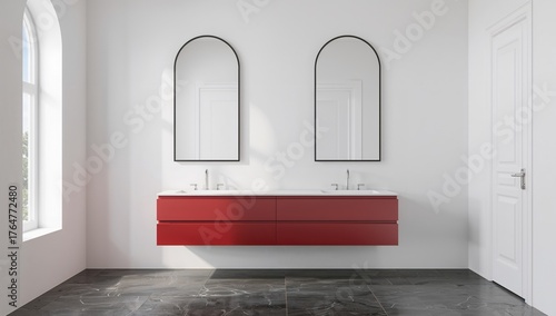A simple red bathroom featu...