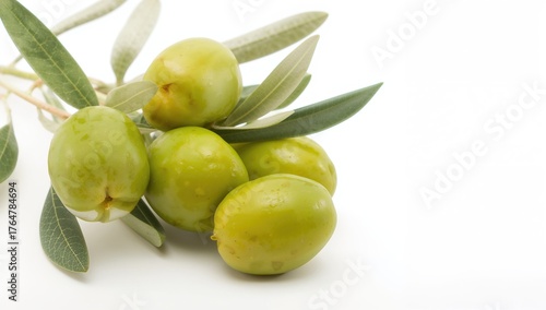 Fresh green olives on a pla...