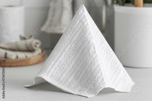 Textured white paper napkin...