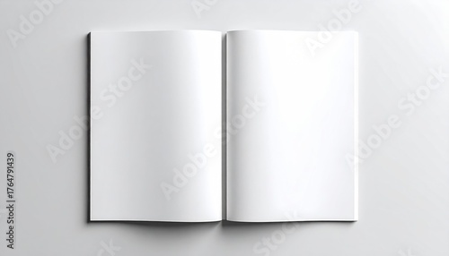 Opened book with blank pages, soft shadows, and a slightly blurred background on a light surface