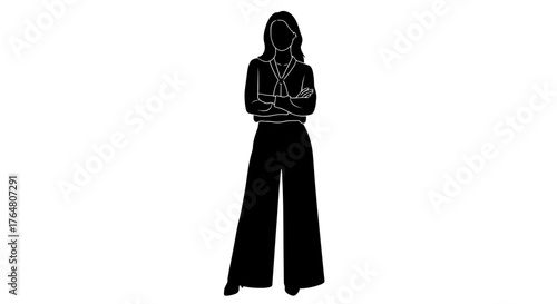Silhouette of a woman in business attire with arms crossed standing