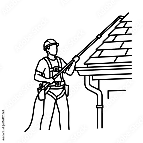 Line person wearing safety harness and helmet, using long pole to clean gutters on house roof