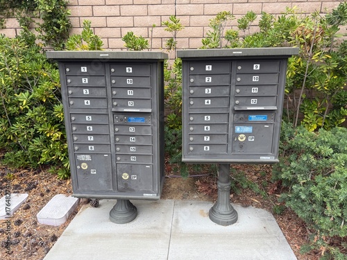 Community Mailbox System: Large, modern centralized mailbox unit with secure parcel lockers for a residential neighborhood.
