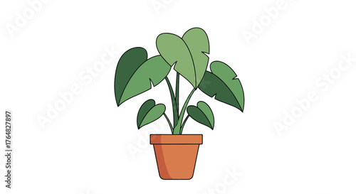 Vibrant potted green plant with lush leaves brings fresh natural beauty and modern home decor appeal to any space