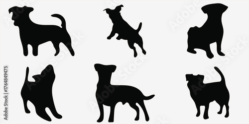 Collection of silhouette dog poses featuring various