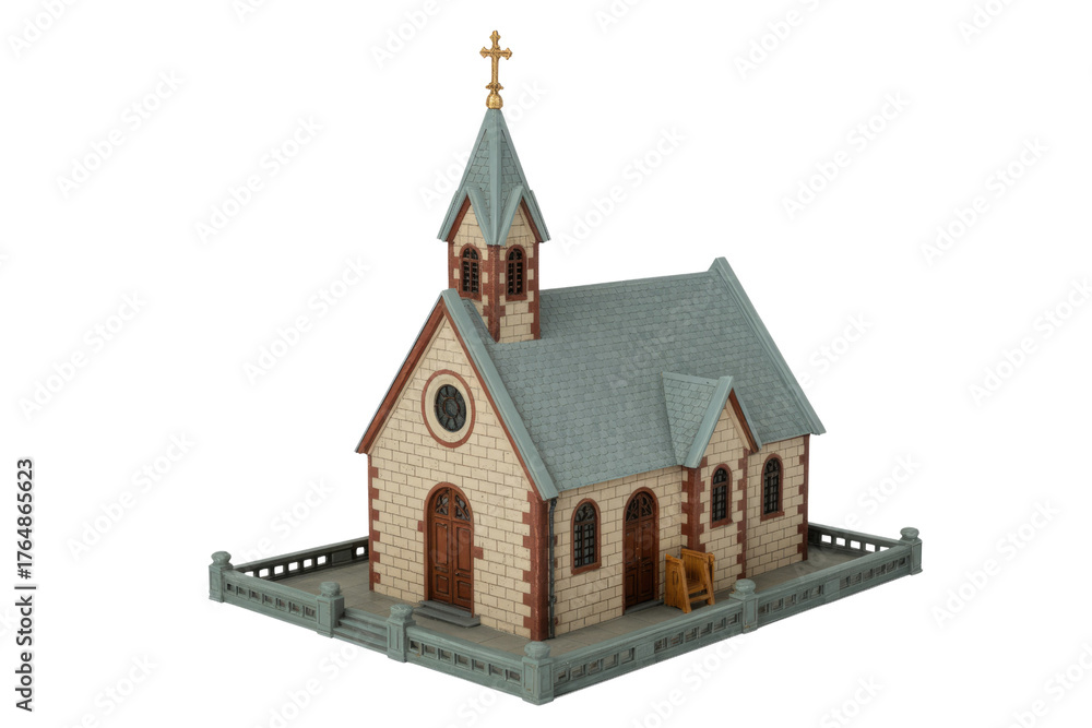 Fototapeta premium A detailed miniature model of a quaint church with a steeple, cross, stone walls, gray roof, and low fence. background removed