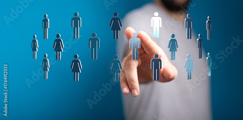 Hand pointing at a human ic...