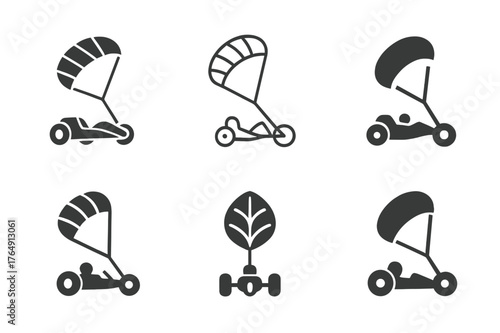 Kite Buggy Logos. Kite buggy. Set Logo of Kite buggy: traction kite towing sand buggy. harmonious logo variations of the same emblematic concept, each with