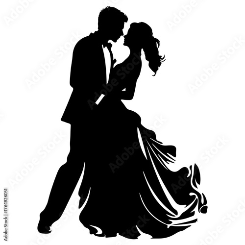 Silhouette of a bride and groom dancing closely together in formal attire on their wedding day shown in black