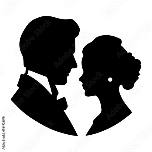 Silhouette of a groom in a suit and a bride with an updo facing each other in black and white design
