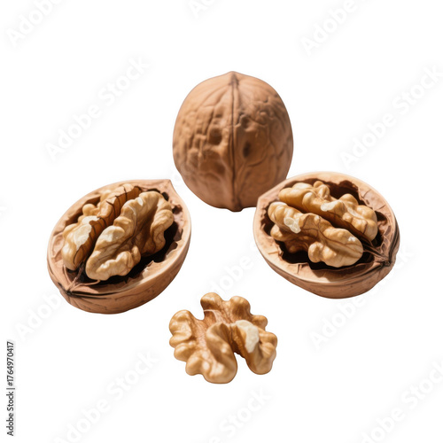 Whole walnut, cracked halves and raw kernel pieces displayed together isolated on transparent background.
