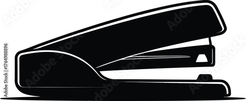 A classic office stapler in black silhouette