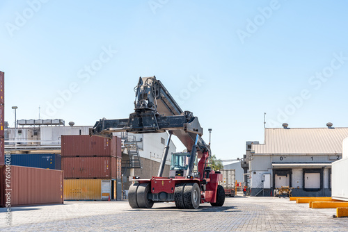 Reach stacker moving containers at a container yard in the port of  Veracruz, Mexico, Manzanillo. reachstackers, Kalmar