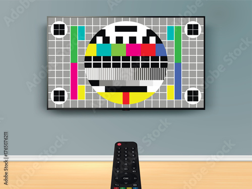 Remote control is pointed at the no signal TV on the wall.