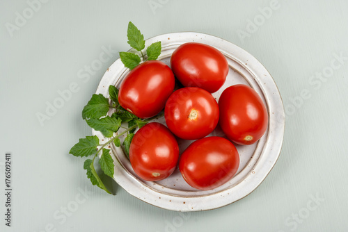 Red ripe roma tomatoes used for pasta sauce or tomatpes sauce in Italian cuisine