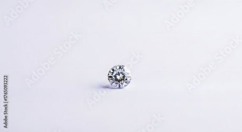 diamond on a pale lavender background in a jewelry style