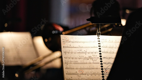 Close up of illuminated music sheet in orchestra before concert