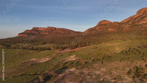 Flinders Ranges, South Australia at Sunrise – 4K Aerial Drone Footage of Rugged Mountains, Red Rocks, Green Valleys, and Golden Morning Light over the Outback Landscape