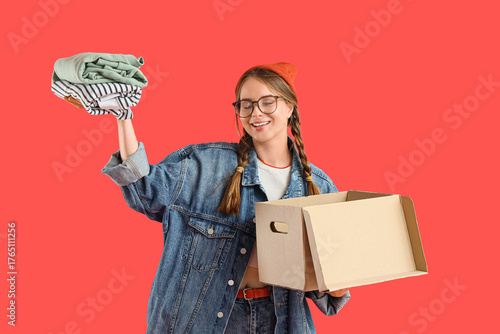 Young woman with cardboard ...