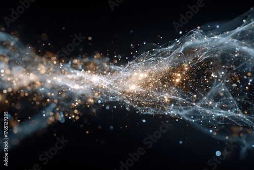Abstract stream of golden and blue particles on a dark, blurred background. Use it for tech, science, or futuristic concepts.