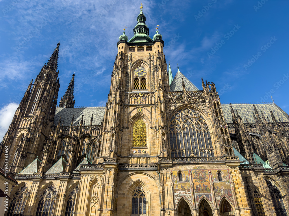 Fototapeta premium Beautiful aerial and detailed view of St. Vitus Cathedral in Prague Castle, Czech Republic, showcasing Gothic architecture, gargoyles, stained glass, and the historic city skyline.