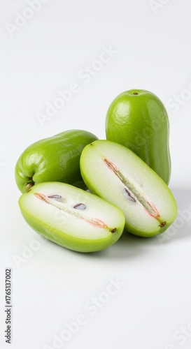 Fresh Water Apple with Slices and Peel on a White Background