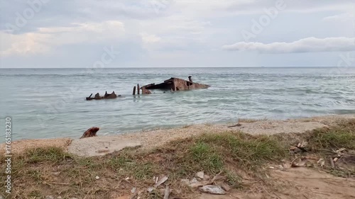 Wallpaper Mural Calm Seaside View with Shipwreck Remains at Tropical Beach Shore Torontodigital.ca
