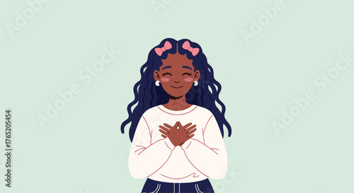 A smiling young girl with dark curly hair and pink bows places her hands over her heart.