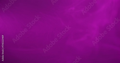 Purple fume. Neon ink splash. Blur vibrant color haze texture acrylic water pigment spreading on abstract underwater art background.