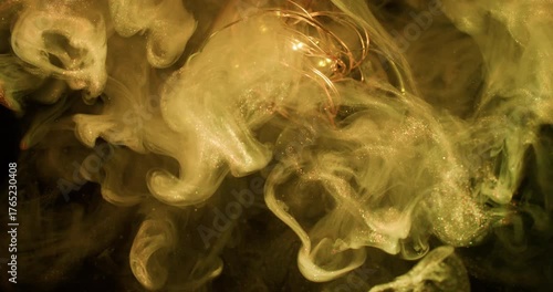 Pigment blur splash. Glowing fume wave. Yellow golden shimmering fog mix ink in liquid. Light bulb garland color abstract black background.