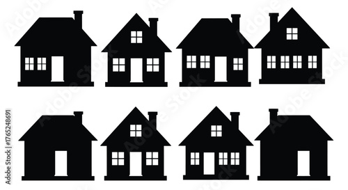 Collection of eight black house silhouettes with chimneys and windows