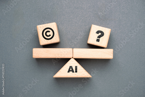 Wooden blocks with AI, copyright, and question mark icons arranged on a balance scale representing copyright challenges, legal uncertainty, and ethics in artificial intelligence