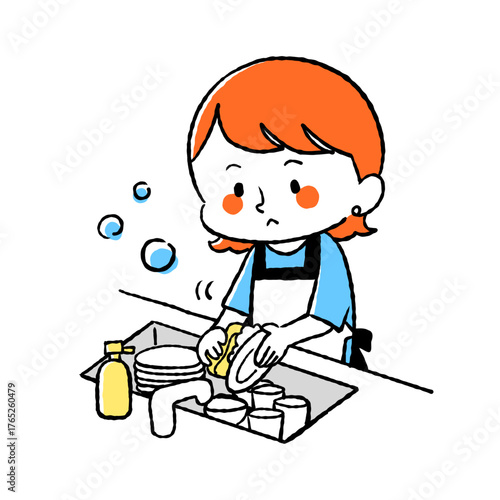 食器洗いをしている主婦