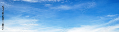 clear blue sky with  few clouds