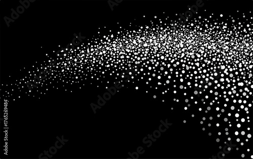 Abstrakcyjny strumień srebrnych drobinek na czarnym tle tworzy dynamiczny wzór.