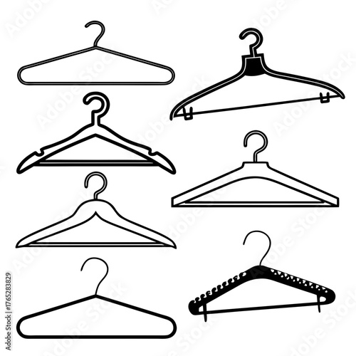 Collection of seven black and white clothing hangers