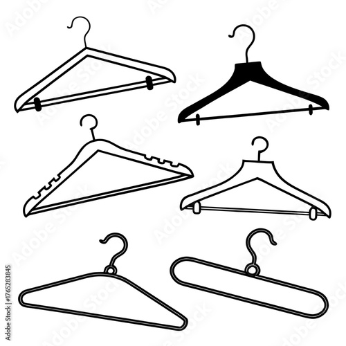 Collection of six black and white clothing hangers