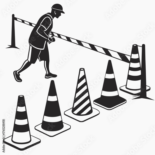 Man in hard hat running past traffic cones and barrier