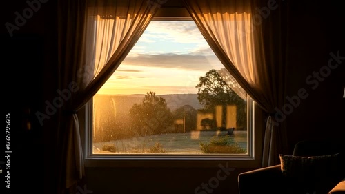 Serene sunset view through a window with curtains, showcasing a tranquil landscape outside
