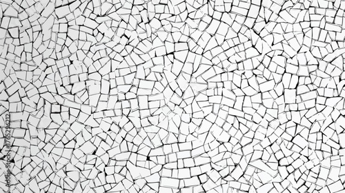 Abstract monochrome mosaic pattern with irregular tesserae and subtle cracks creating a textured background.