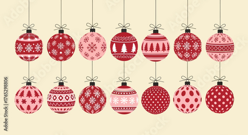 A festive collection of hanging red and pink Christmas ornaments with various winter patterns.