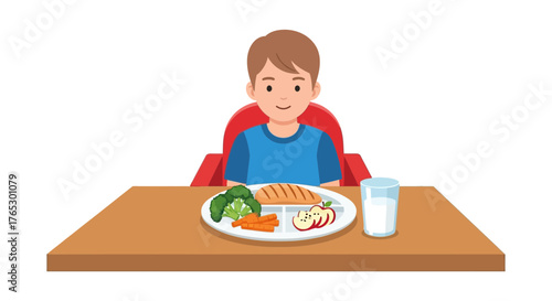Cheerful young boy enjoys healthy meal of broccoli, carrots, grilled chicken, and apple slices with milk at table, promoting healthy eating habits