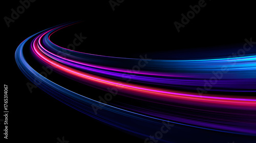 Abstract light trails in vibrant colors against a dark background, evoking a sense of speed and dynamism