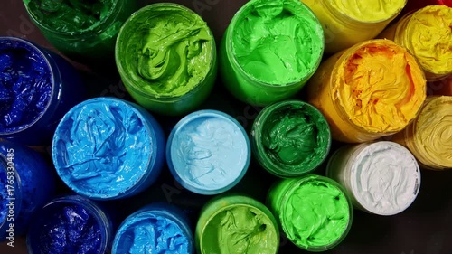 An artistic composition showcasing a rainbow of richly textured paints, symbolizing creativity, inspiration, and the endless possibilities of color.