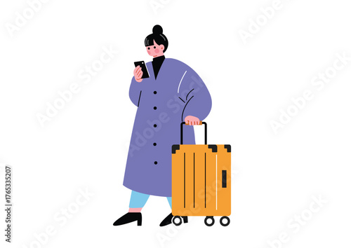 旅行先でスマホウェを操作しながら歩く女性